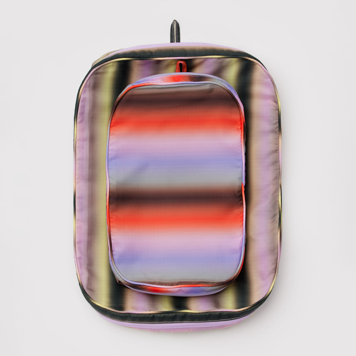 Top view of multicolored striped pouches.