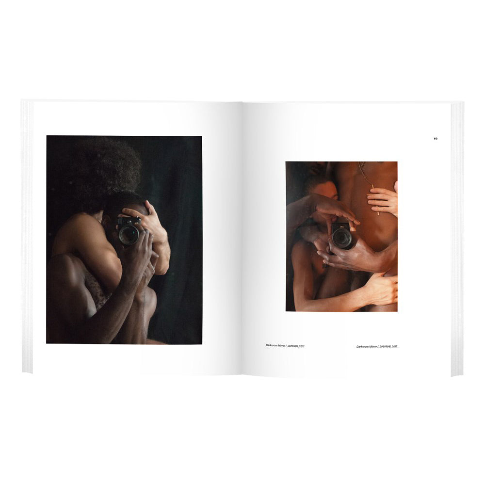 Interior spread; one photo on each page.