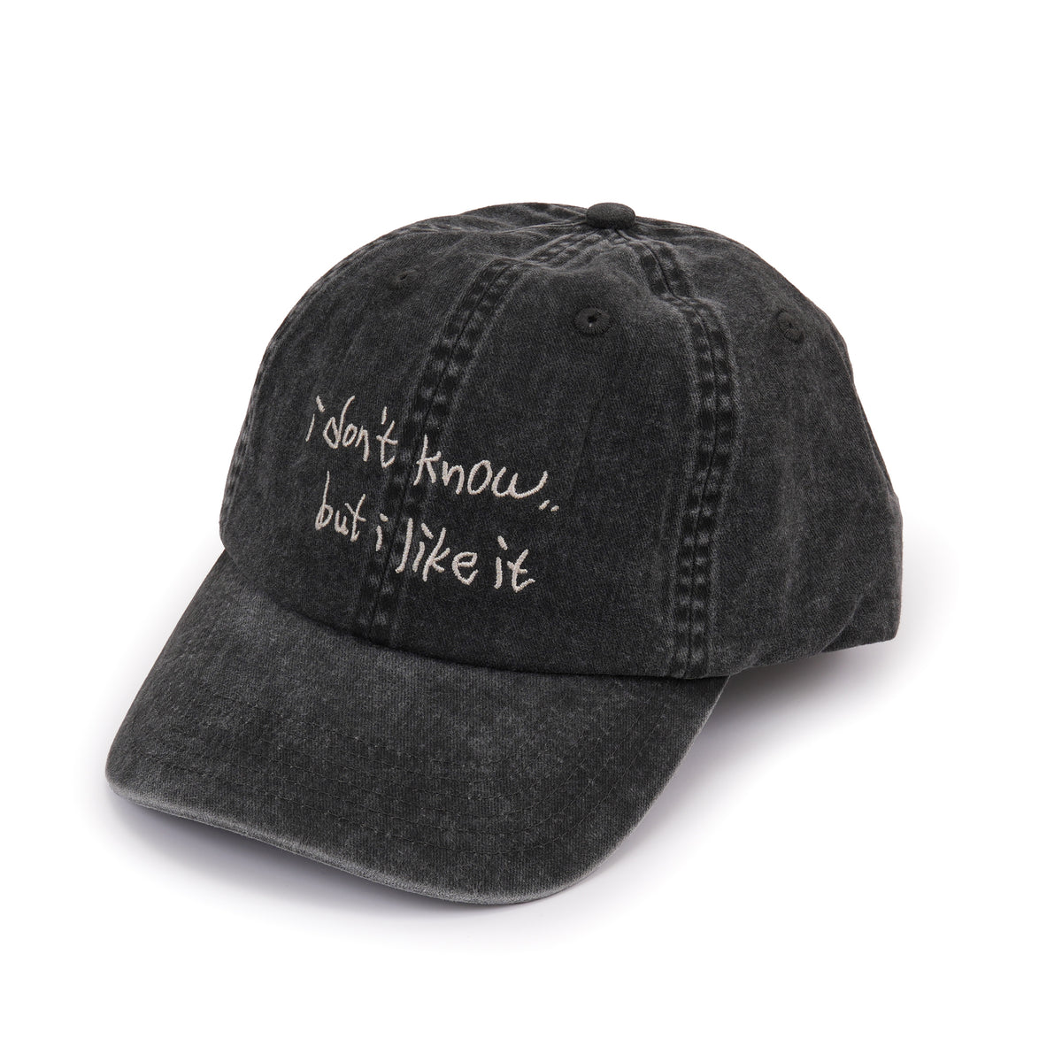 A washed black baseball cap with white embroidered text reading 'i don't know, but i like it'.