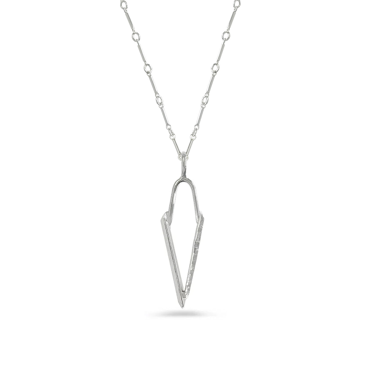 Silver necklace with a geometric pendant on a white background