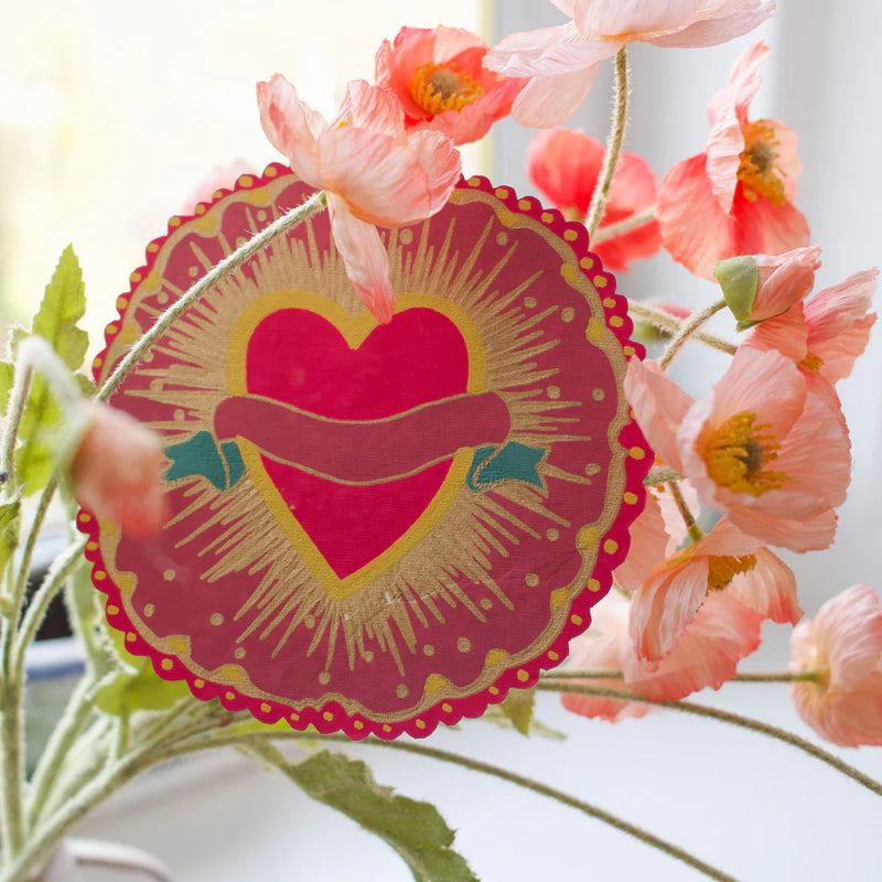 Decorative heart-shaped card with floral background