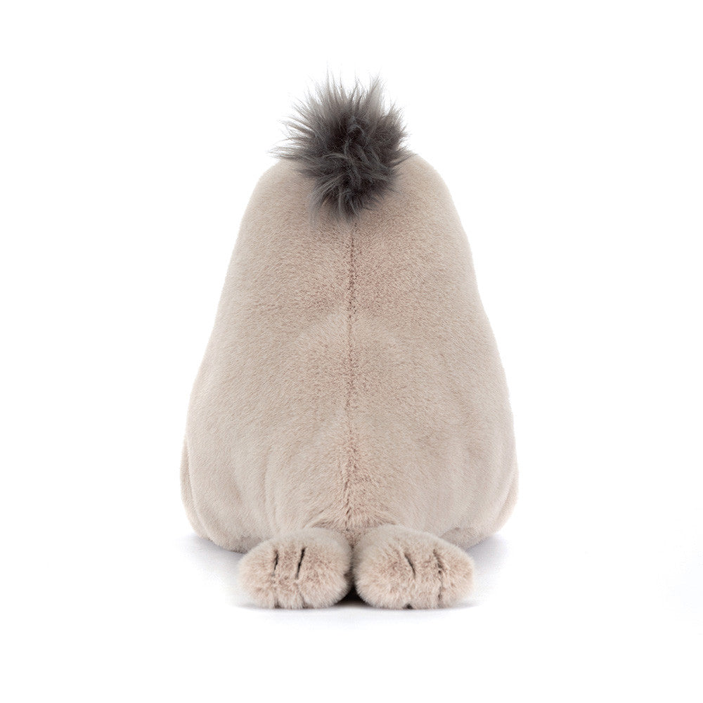 Rear view of a seal plush toy on a white background.