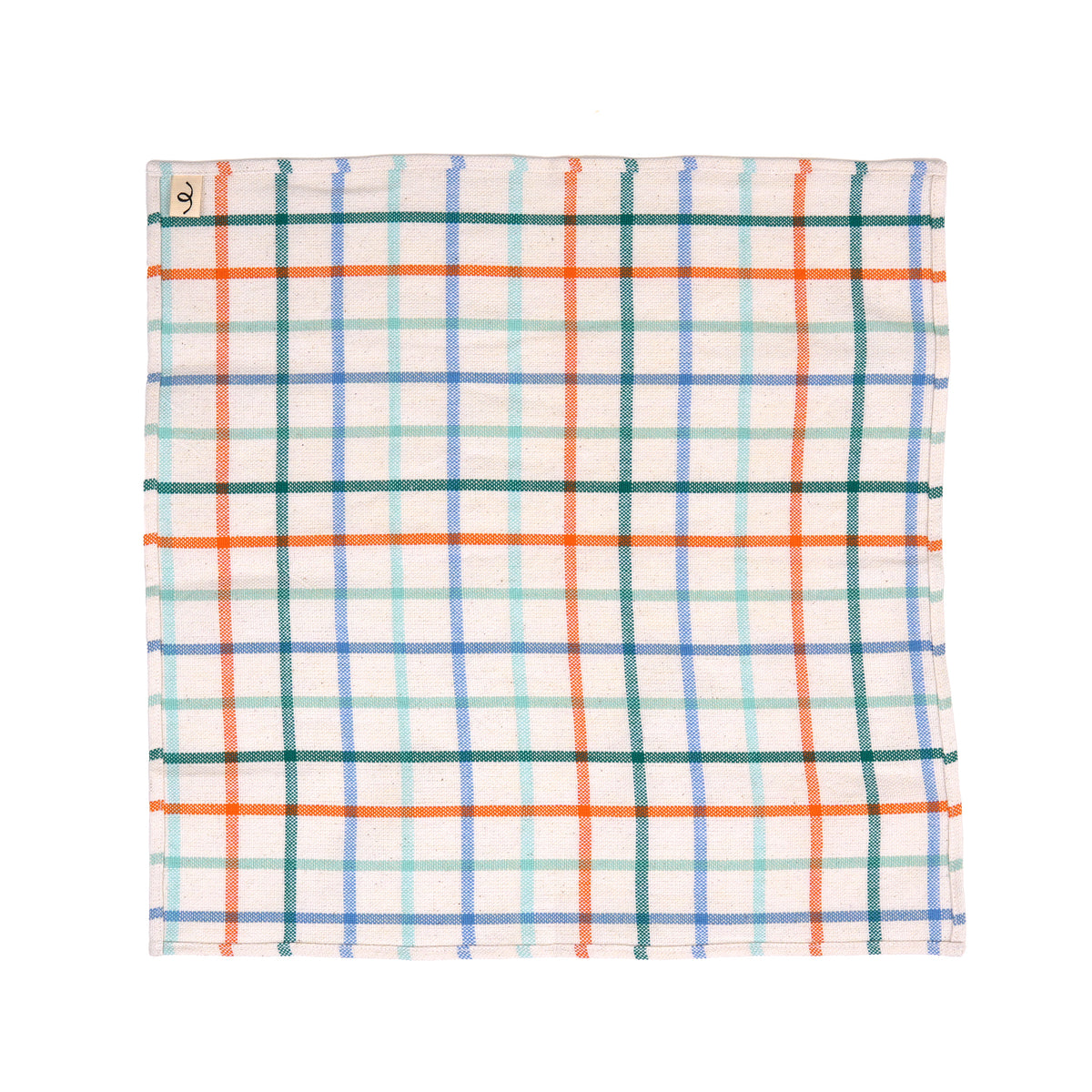 A square cotton kitchen towel with a multicolor plaid pattern on a white background, featuring orange, green, and blue intersecting stripes. A small logo tag is visible in the top-left corner.