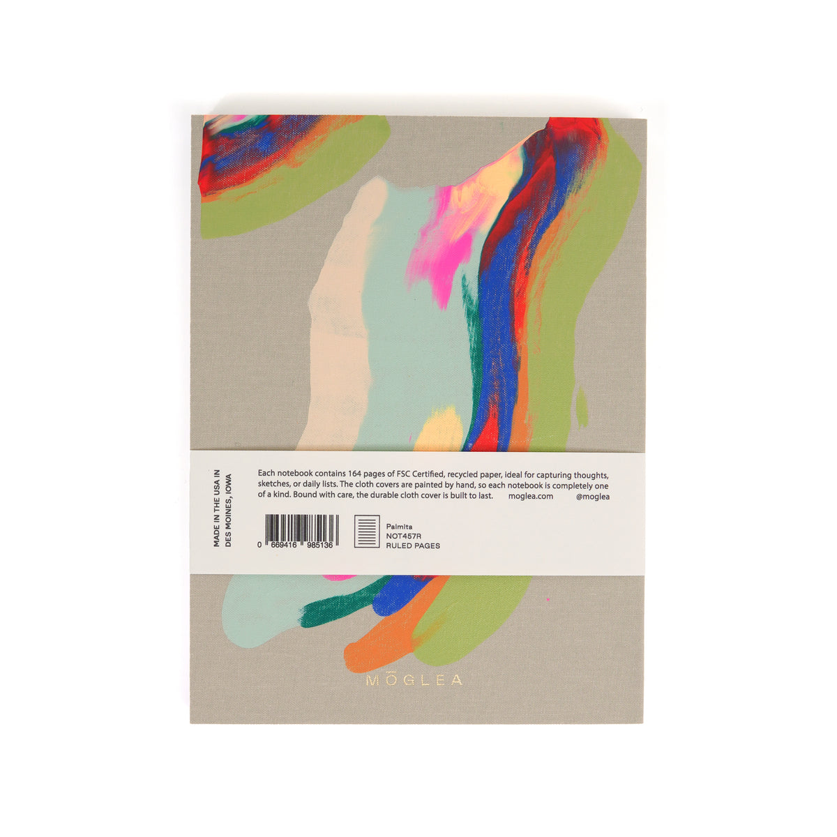 Notebook with colorful abstract design on a beige background