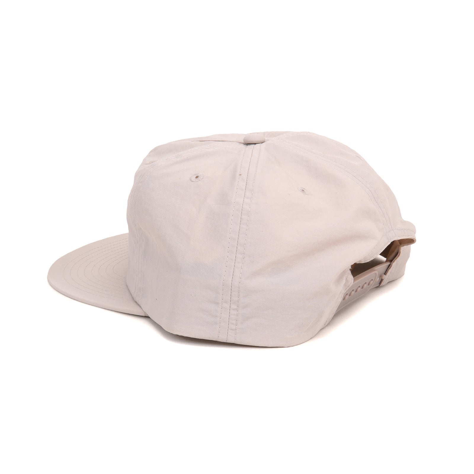 A light beige nylon flat-brim cap with 'SF MO MA' embroidered in red on the front, shown on a plain white background.