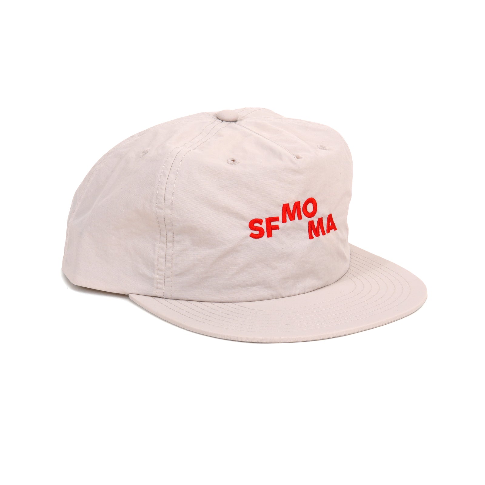 A light beige nylon flat-brim cap with 'SF MO MA' embroidered in red on the front, shown on a plain white background.