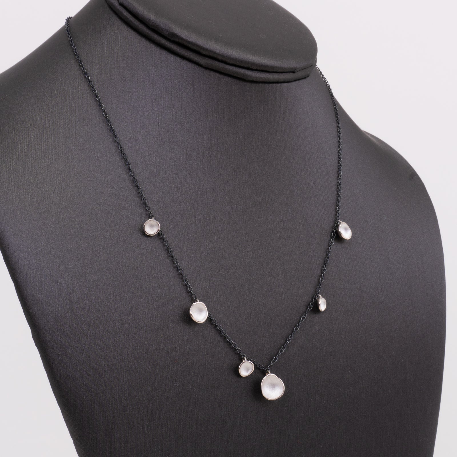 6-Pod Drop Necklace: Sterling and Oxidized Sterling on white