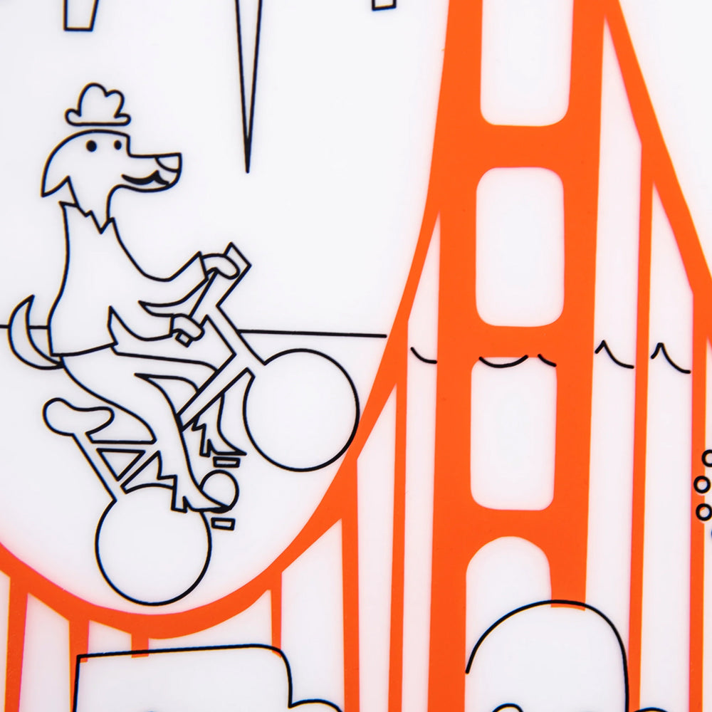 Cartoon dog riding a bike with a large orange structure in the background