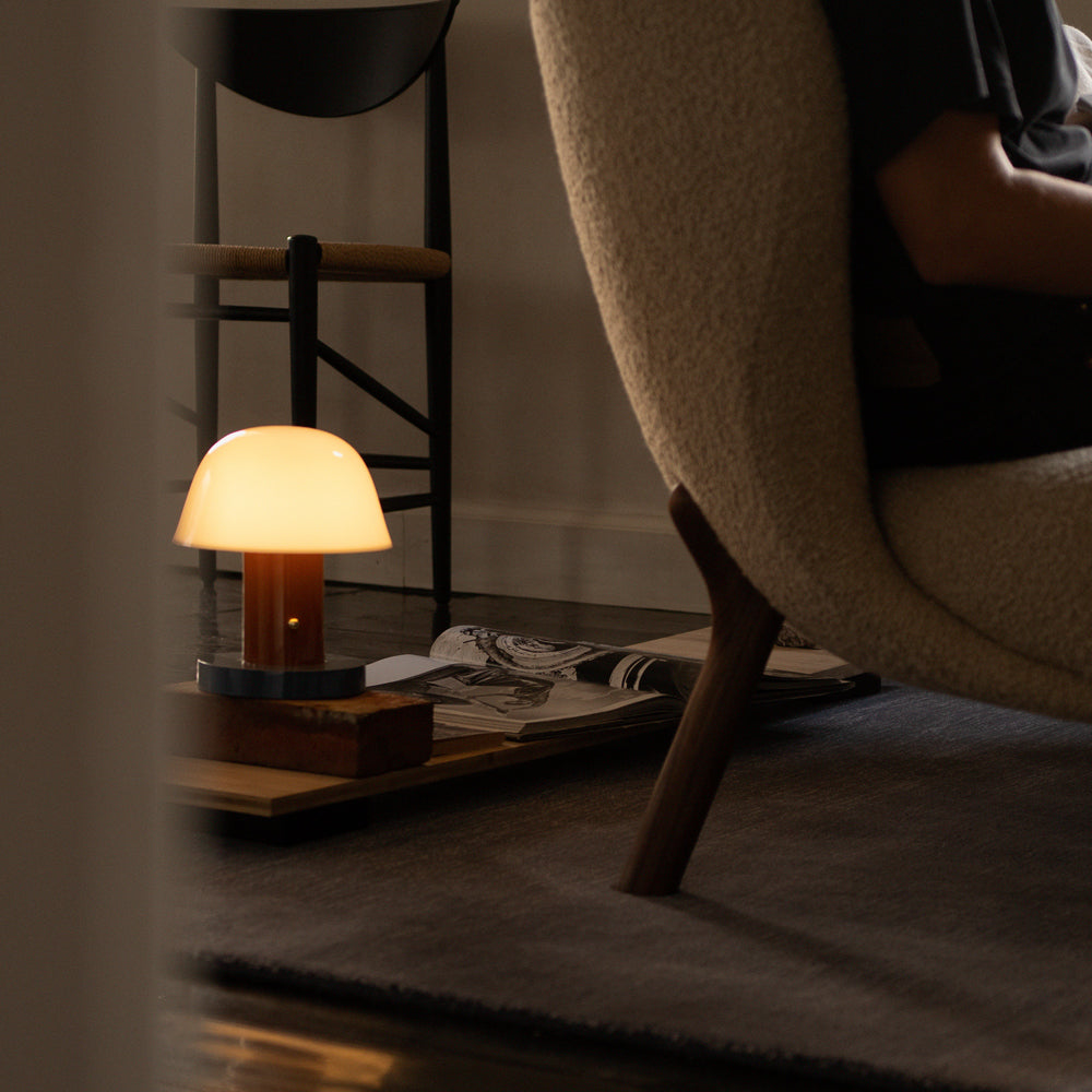 Portable lamp, light on inside home.