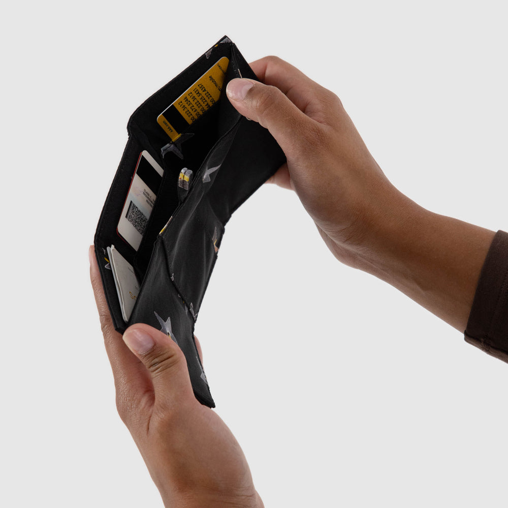 Model holding wallet.