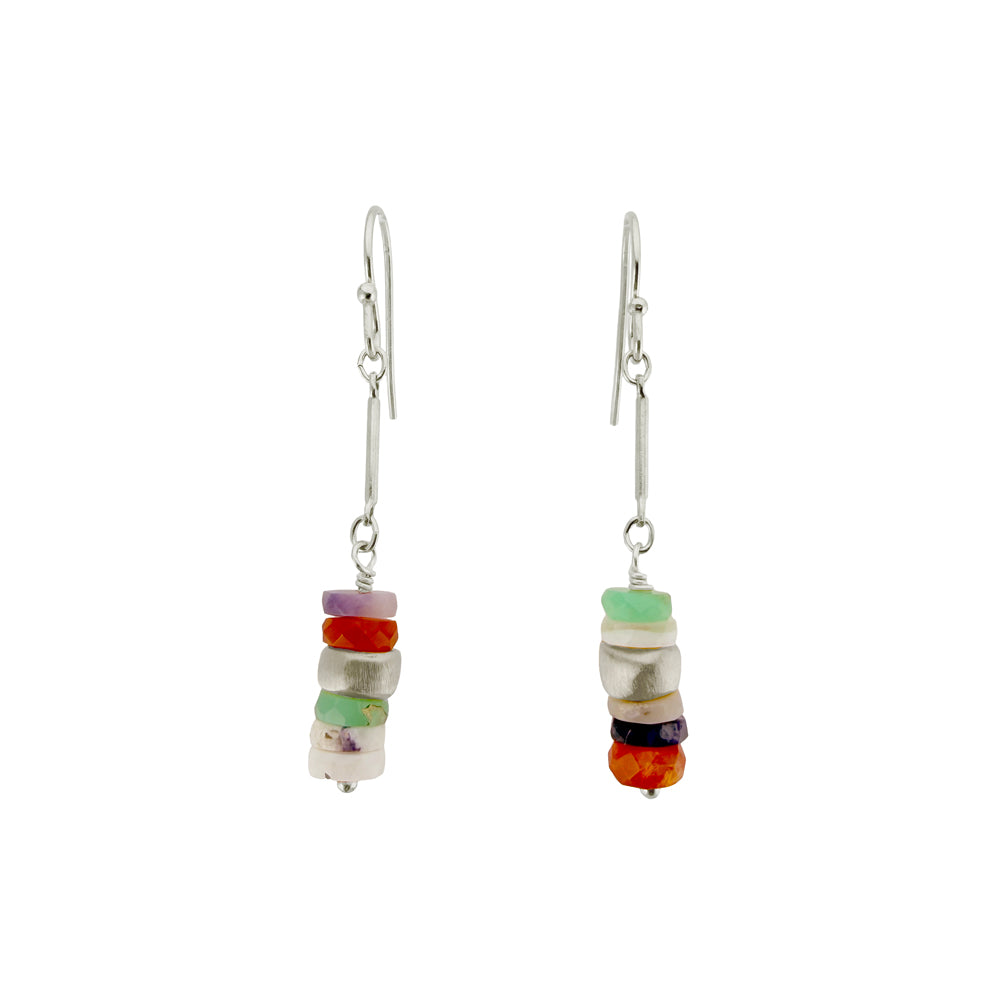Pair of earrings with colorful beads on a white background