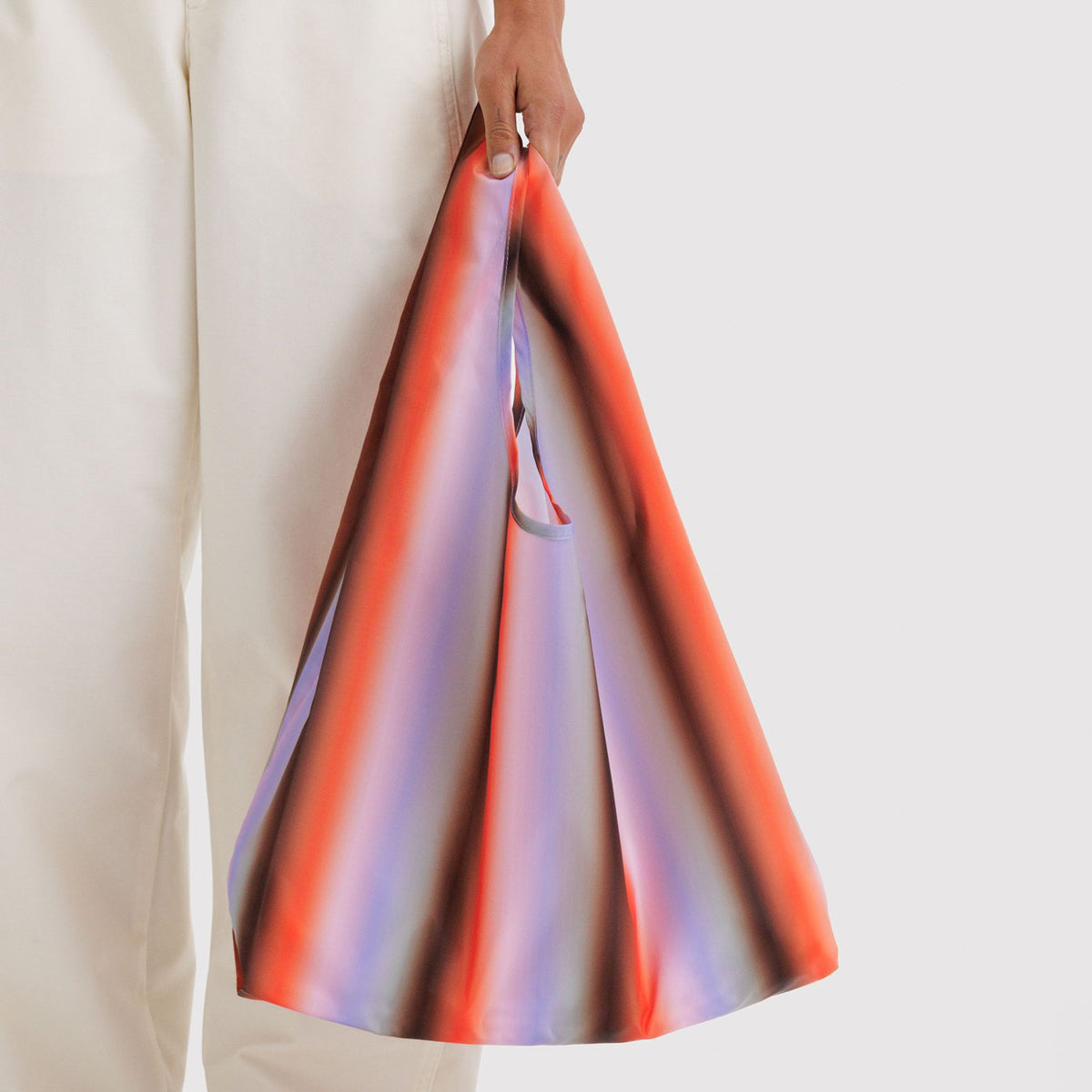 Multicolored reusable bag on a white background