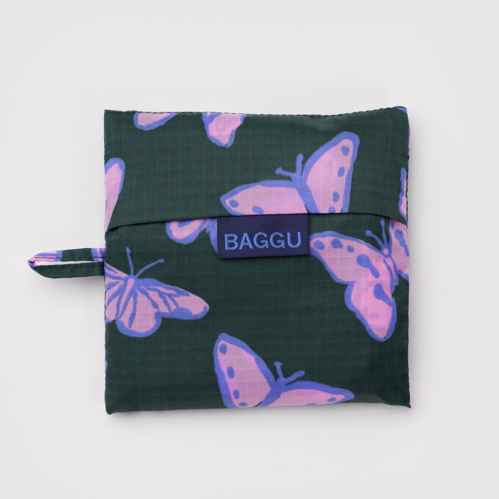 Reusable bag with purple butterfly pattern.