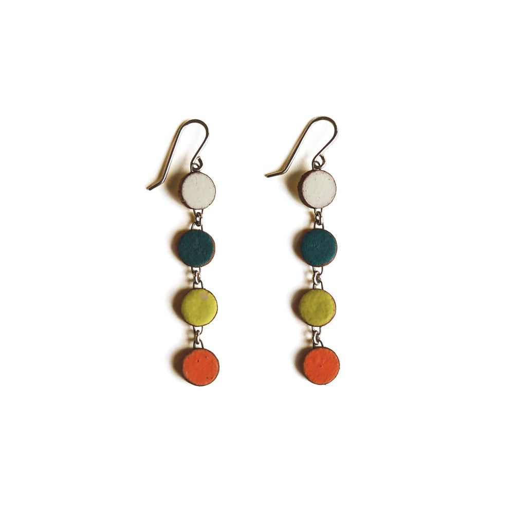 Colorful circular earrings on a white background