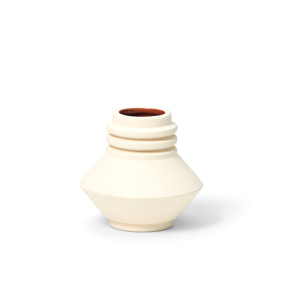 Mini Strata Vase: Cream on display.