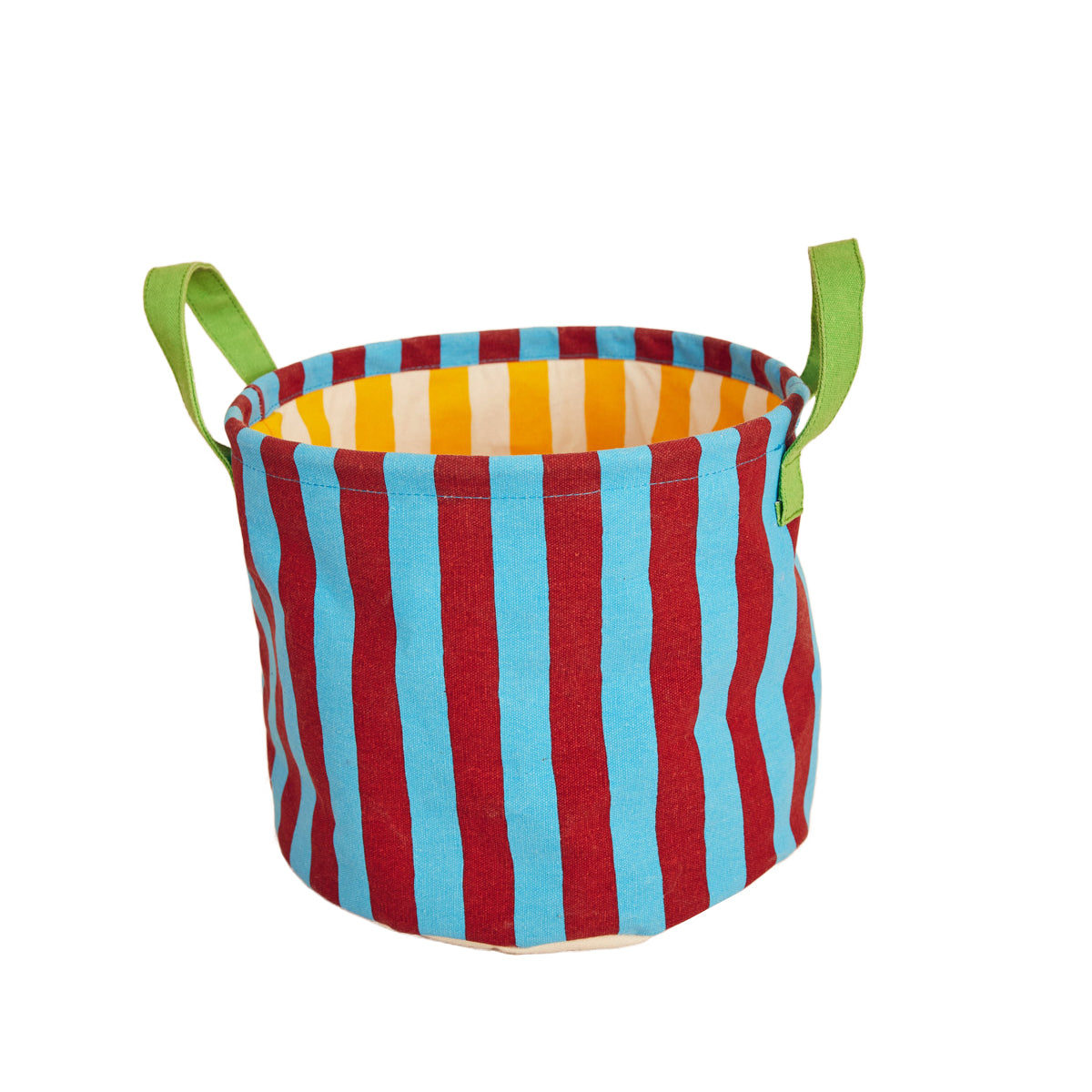 Colorful striped canvas bin with green handles on a white background