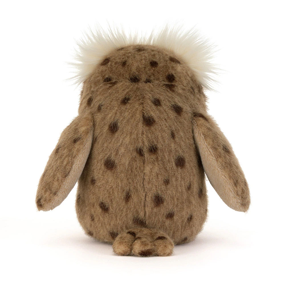 A plush stuffed animal shown from the back, featuring a brown fur-like body with dark brown spots and fluffy white hair on a white background.