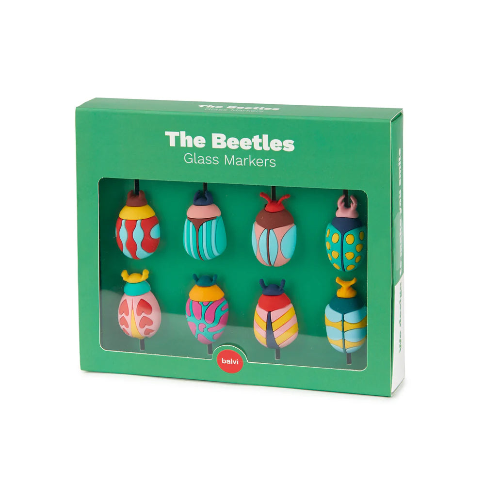 Box of colorful glass markers shaped like beetles with 'The Beetles' branding.