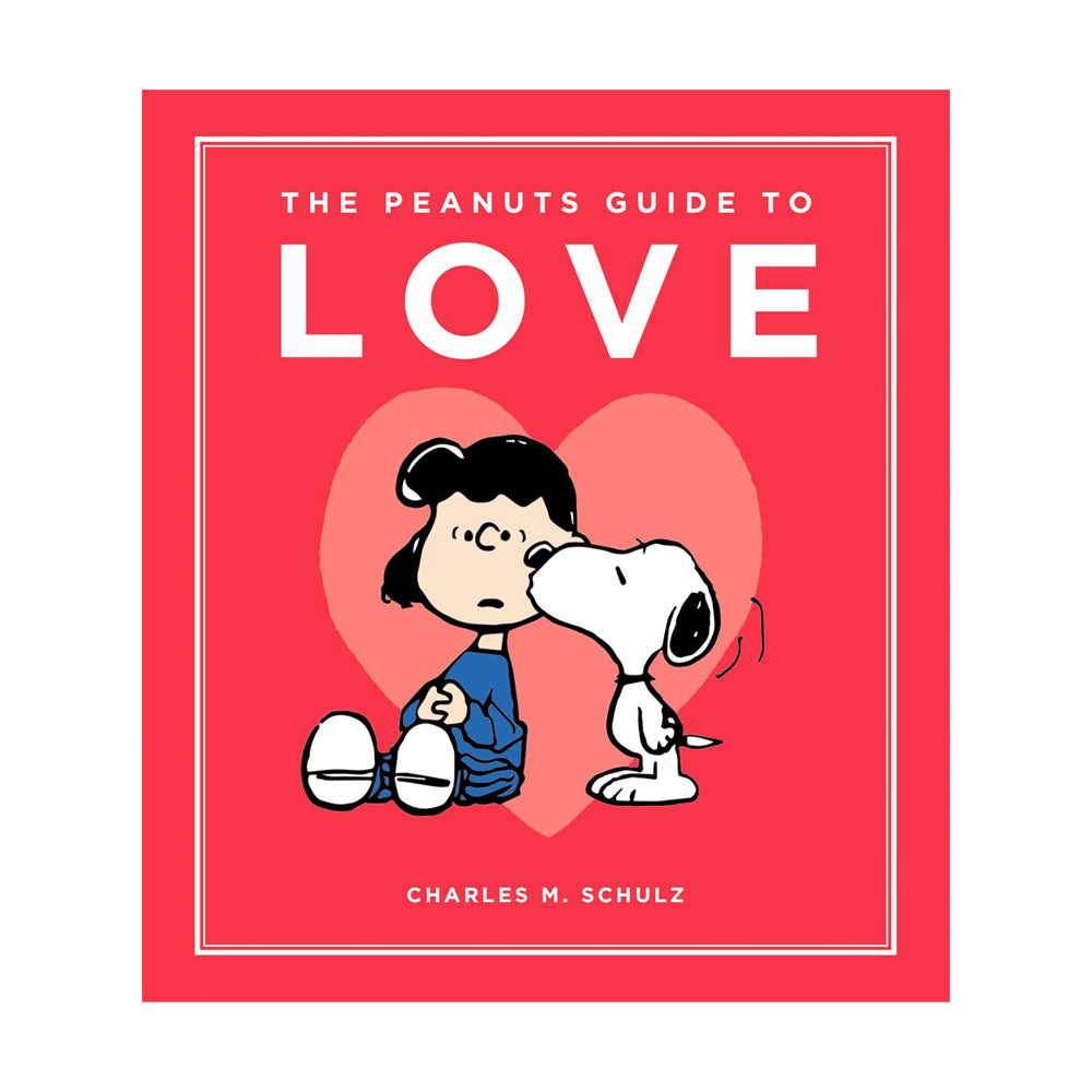 Book cover of 'The Peanuts Guide to Love' with Snoopy and a girl on a red background