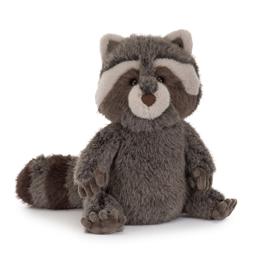 Plush raccoon toy on a white background