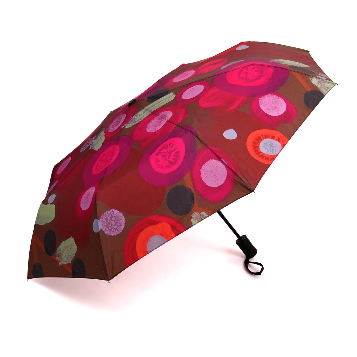 Colorful umbrella with circular pattern on a white background