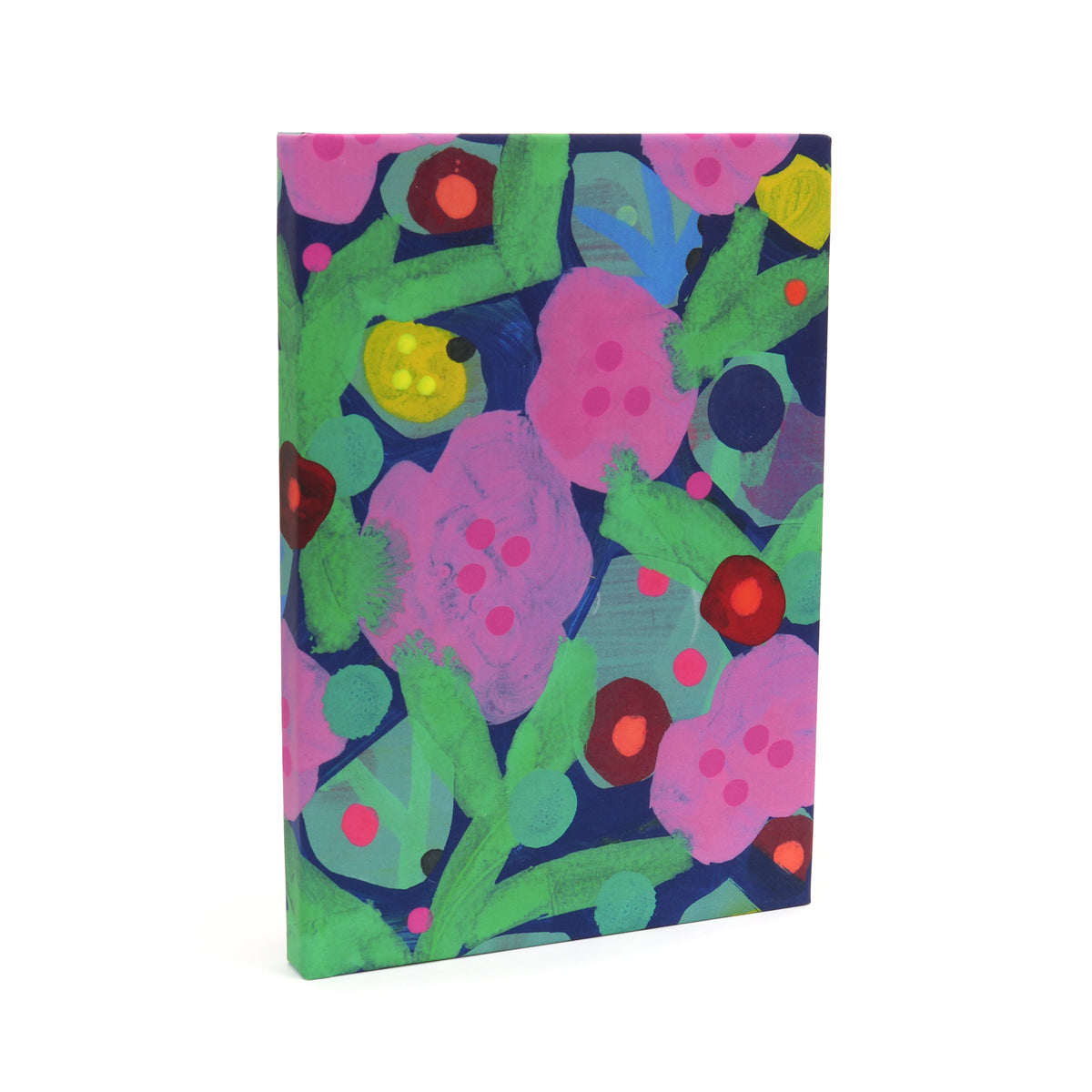 A vertical canvas art print featuring a colorful, textured abstract floral pattern with pink flowers, green leaves, and red and yellow accents on a dark navy background, shown on a clean white studio background.