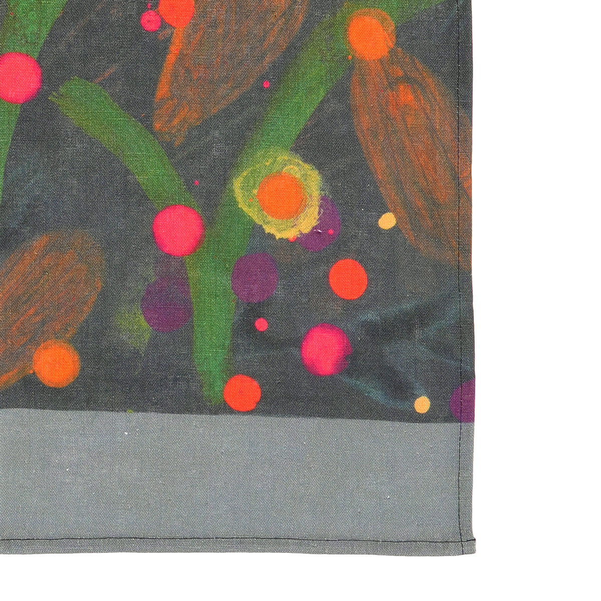 A dark charcoal gray rectangular tea towel featuring a colorful abstract floral pattern with green stems, yellow and orange flowers, brown leaf-like shapes, and pink, orange, and purple dots. A solid gray band runs along the bottom edge.