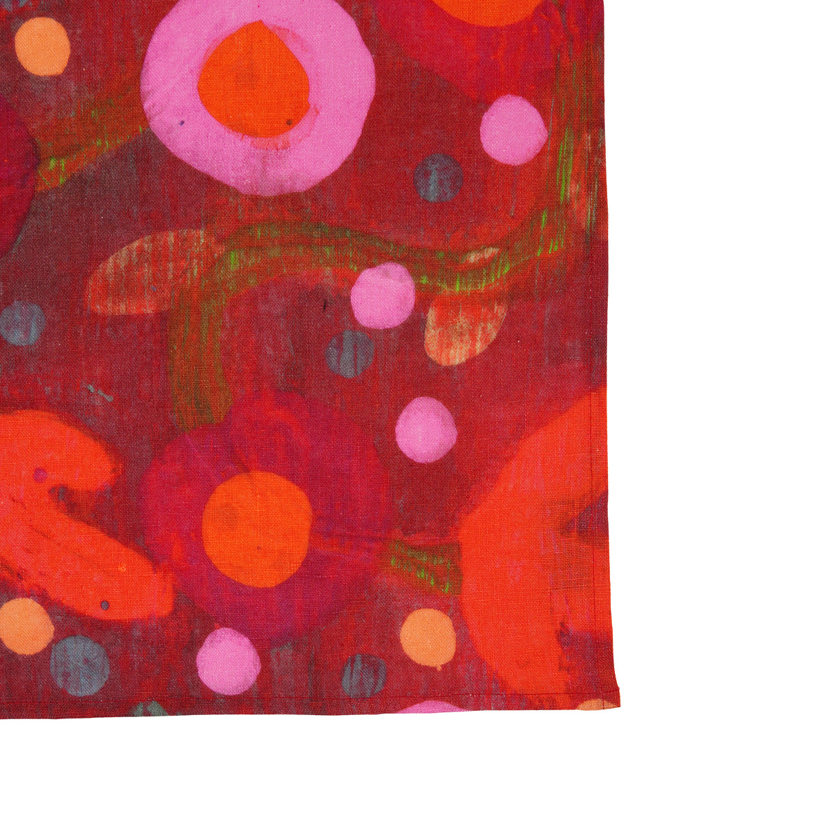 A rectangular textile or fabric panel featuring an abstract floral pattern with concentric circles and organic shapes in red, orange, pink, green, and small gray dots, shown flat against a plain white background.