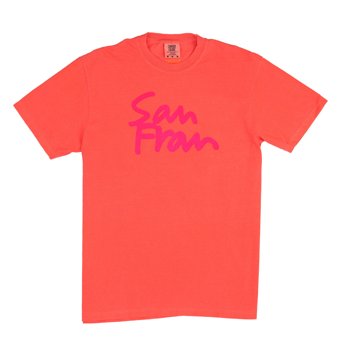 A bright coral orange crewneck t-shirt featuring the words 'San Fran' printed across the chest in a vibrant pink script font, displayed flat against a solid white background.