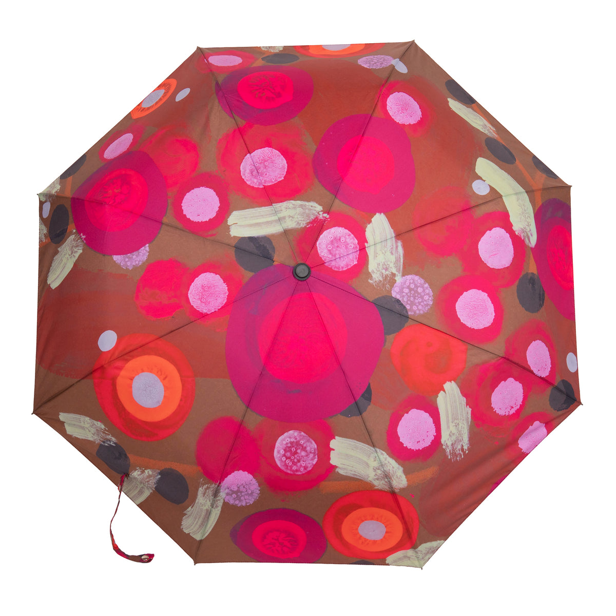 An open umbrella with a brown background and a colorful abstract pattern of overlapping circles and brushstrokes in pink, red, orange, white, and beige.