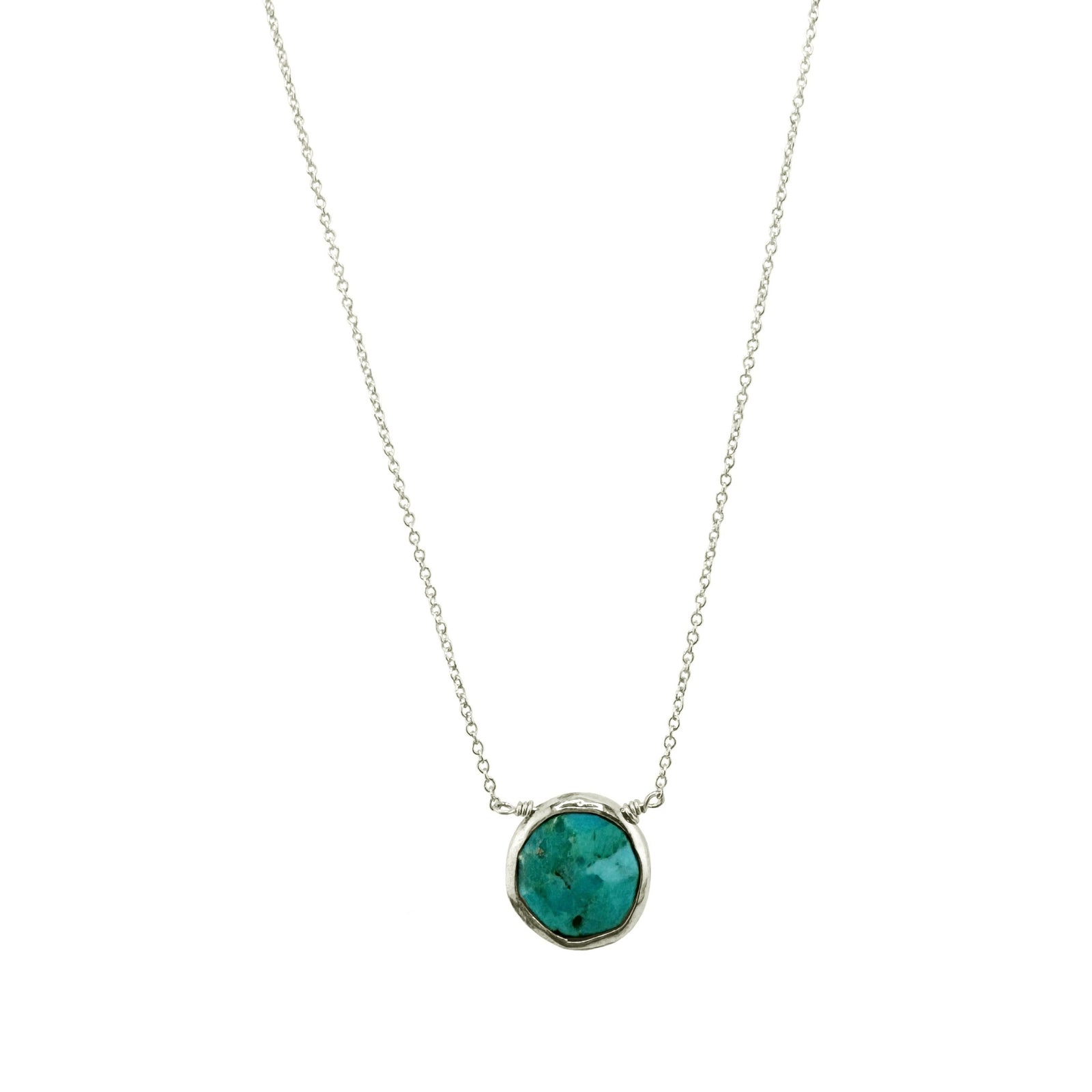 Necklace with a turquoise pendant on a white background