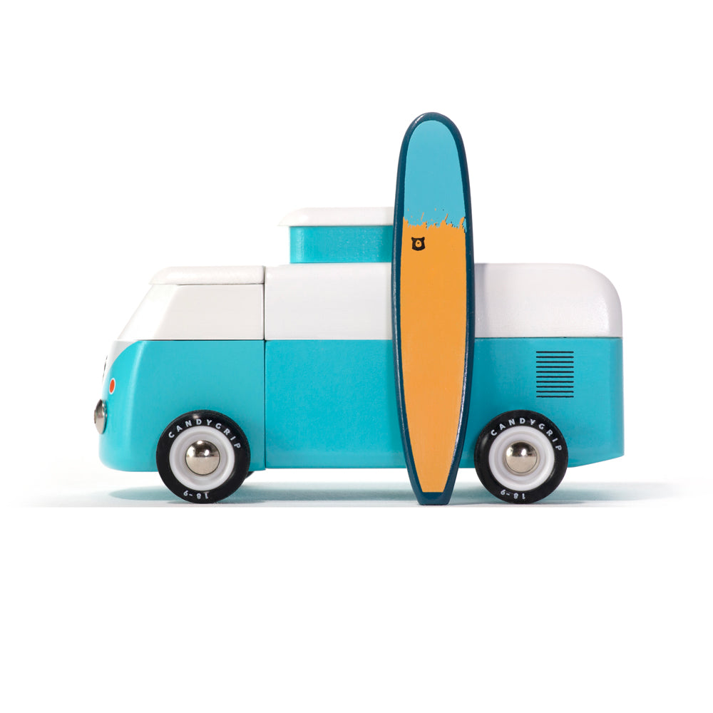 The Beach Bus: Blue side view with surfboard.