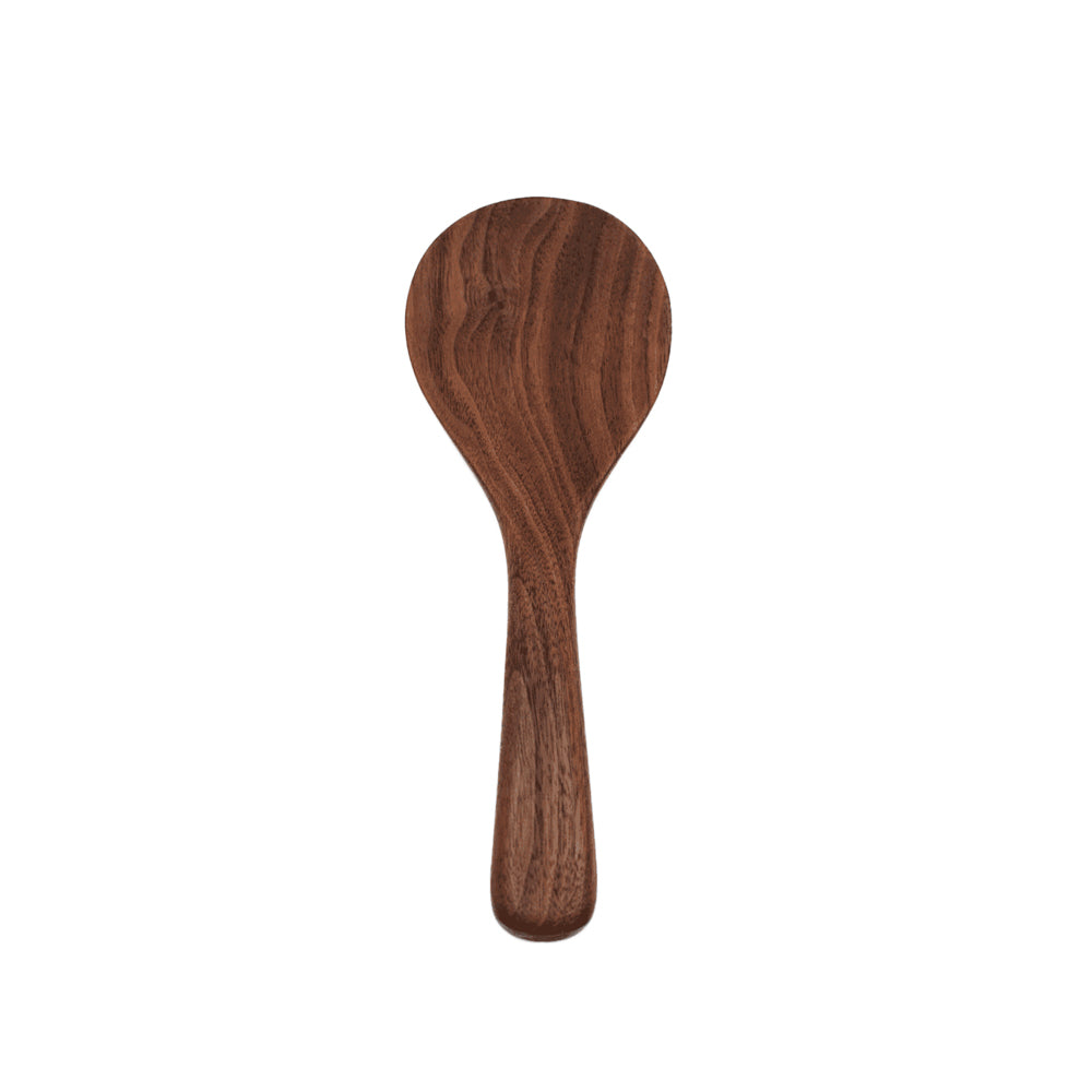 Wooden spoon on a white background