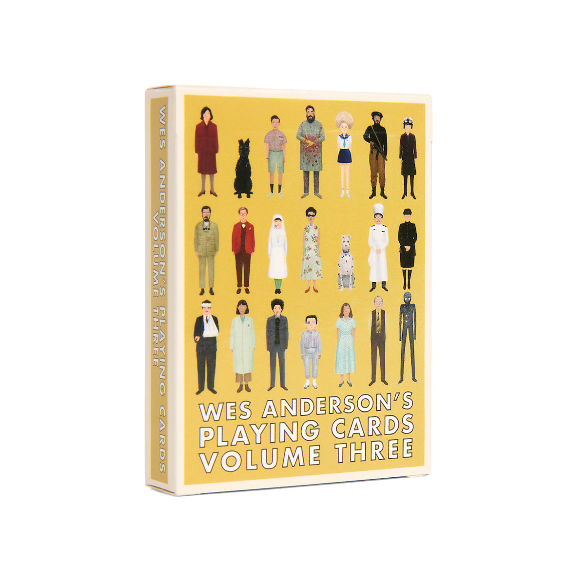 A boxed card deck titled 'Wes Anderson's Playing Cards Volume Three' shown upright on a clean white background. The front and spine are visible, with a mustard-yellow face featuring illustrated figures in varied clothing and white title text.