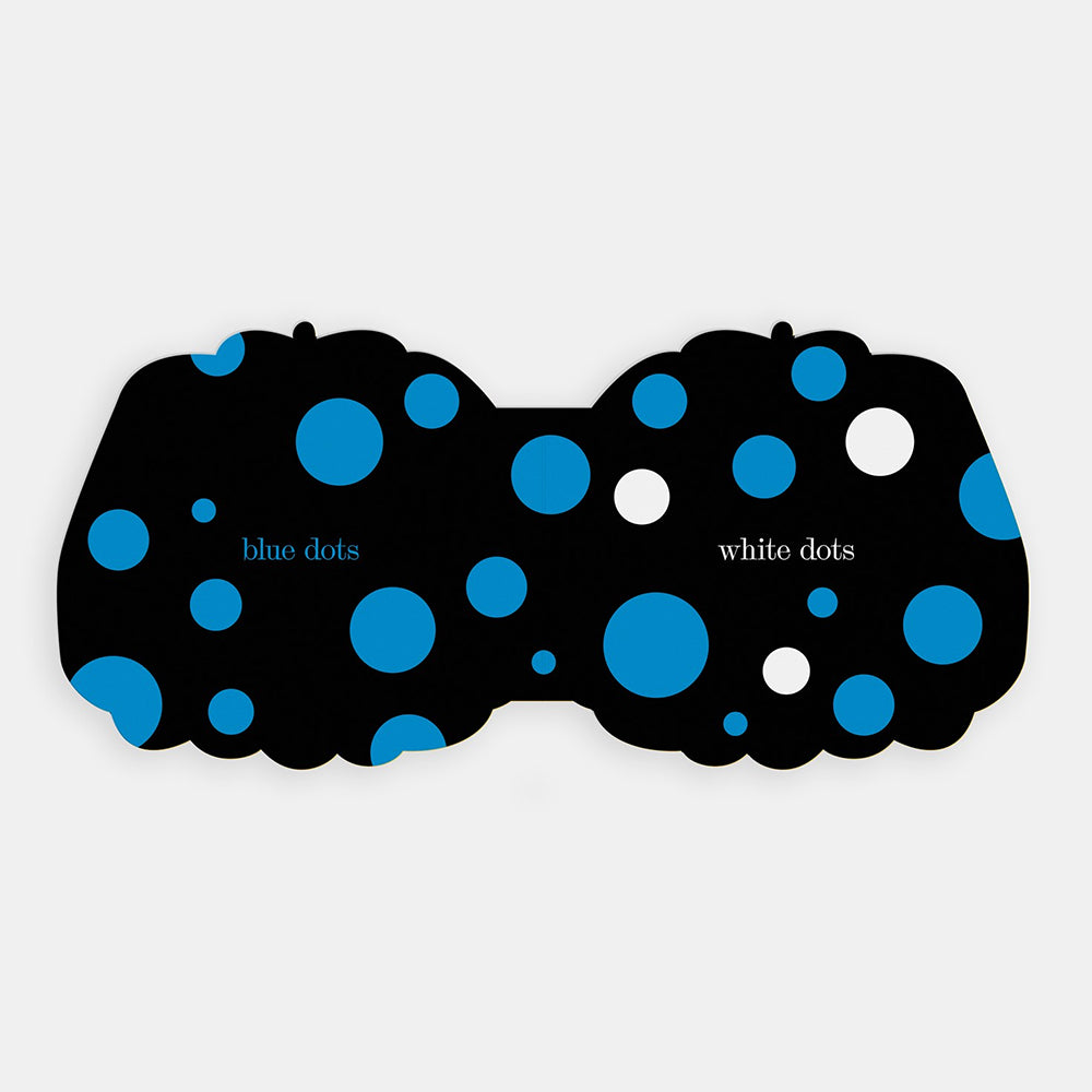 Black interior spread with blue and white polka dots on a light gray background