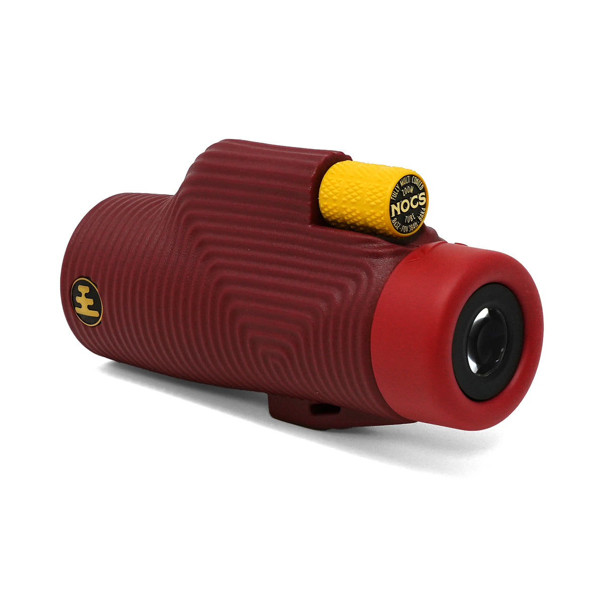 A red and yellow rangefinder with a ribbed textured body, a yellow NOCS safety cap, and a gold logo emblem, shown on a white background.