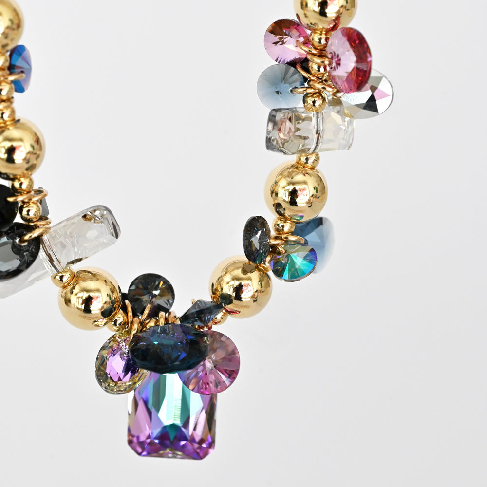 Close-up view, Necklace with multicolored crystals on a white background