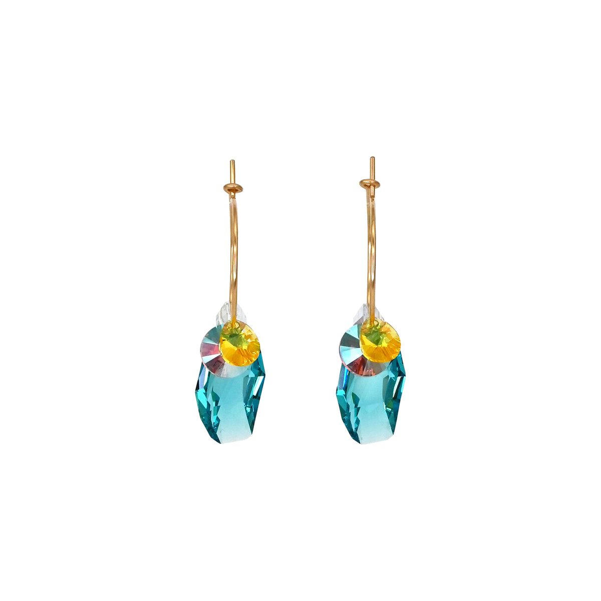 Pair of earrings with blue teardrop-shaped stones and gold hoops on a white background (front view).