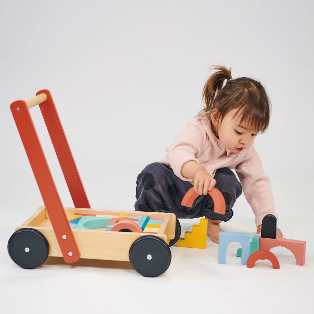 Toddler playing with blocks.