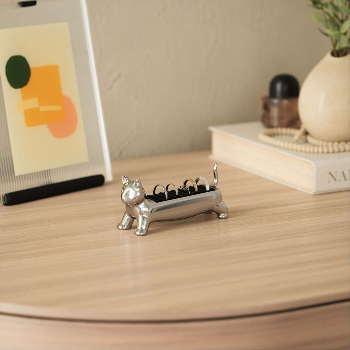 Cat ring holder on desk.
