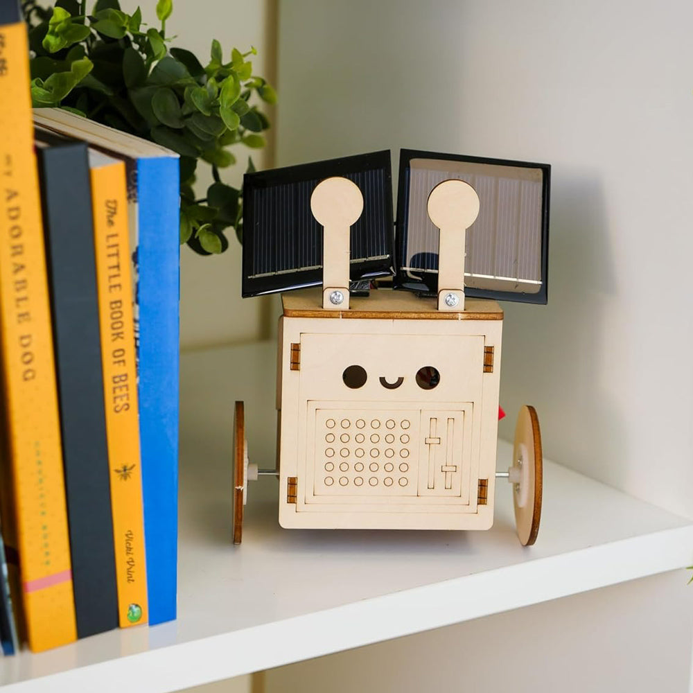 Eco Bot displayed on bookshelf.