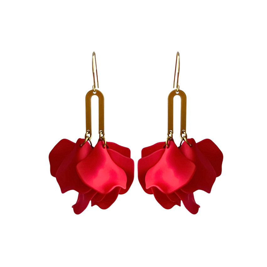 Red petal-shaped earrings with gold hooks on a white background