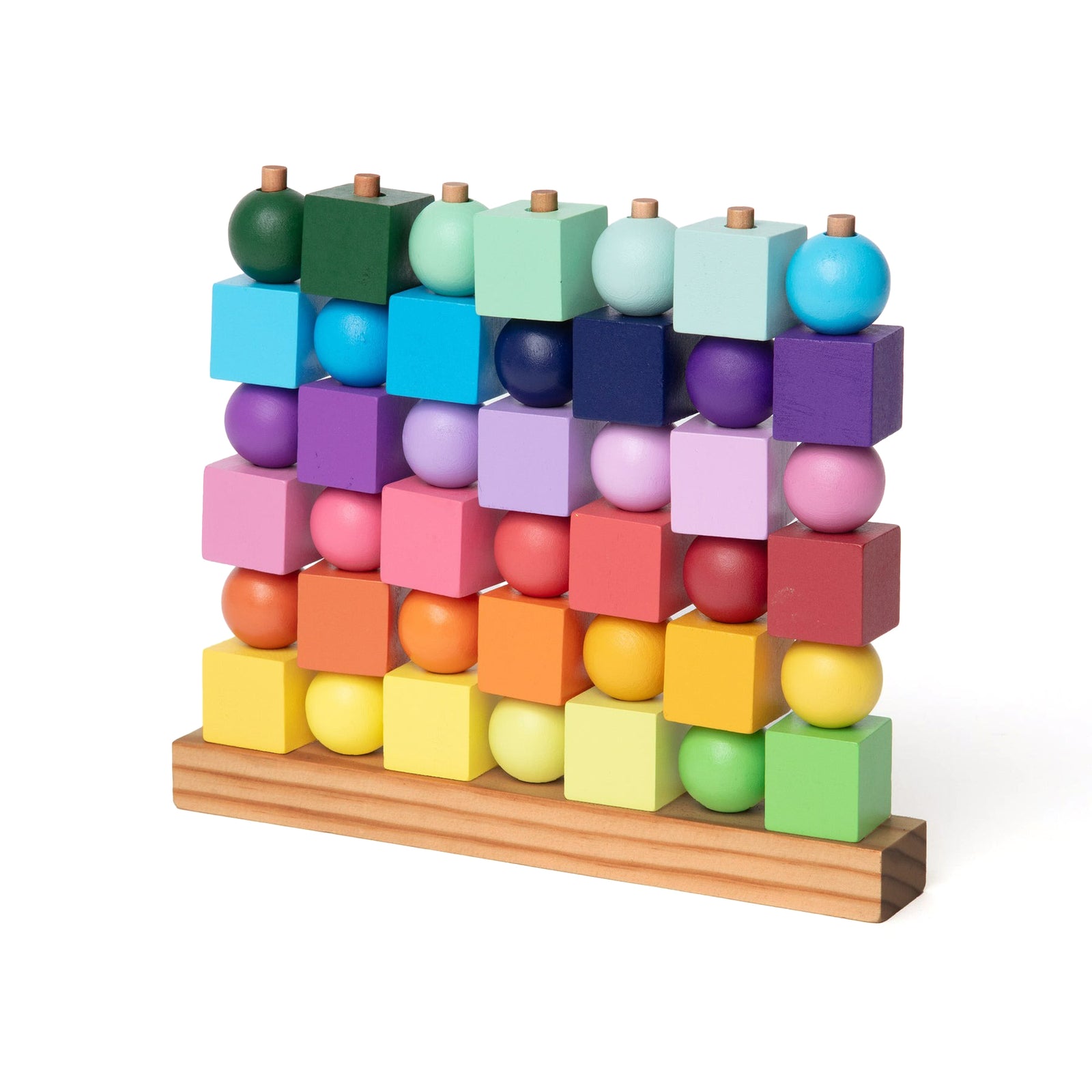 Colorful geometric block tower on a white background