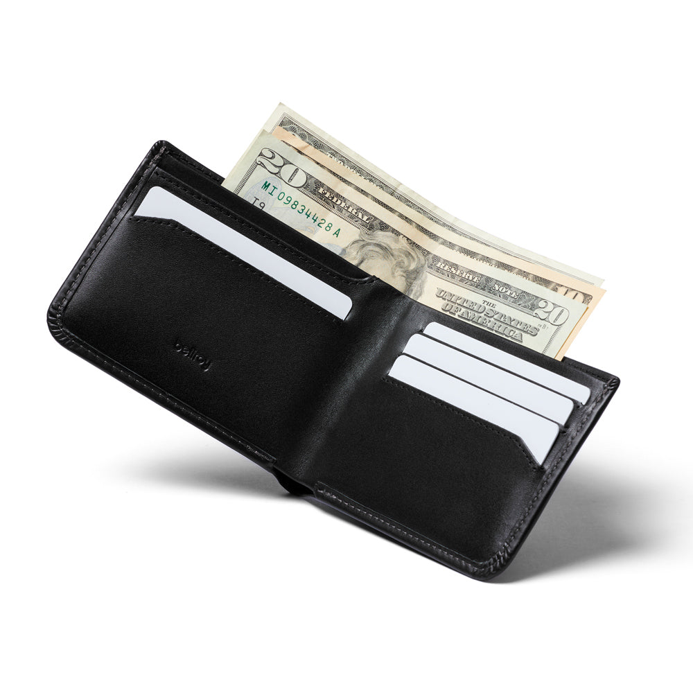Open wallet with cards and cash inside.