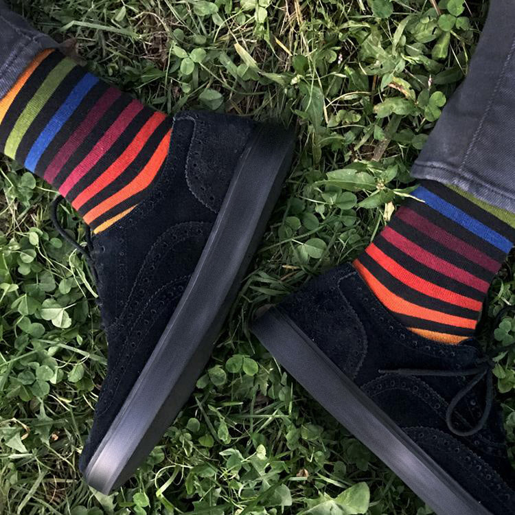 Colorful striped sock on a white background