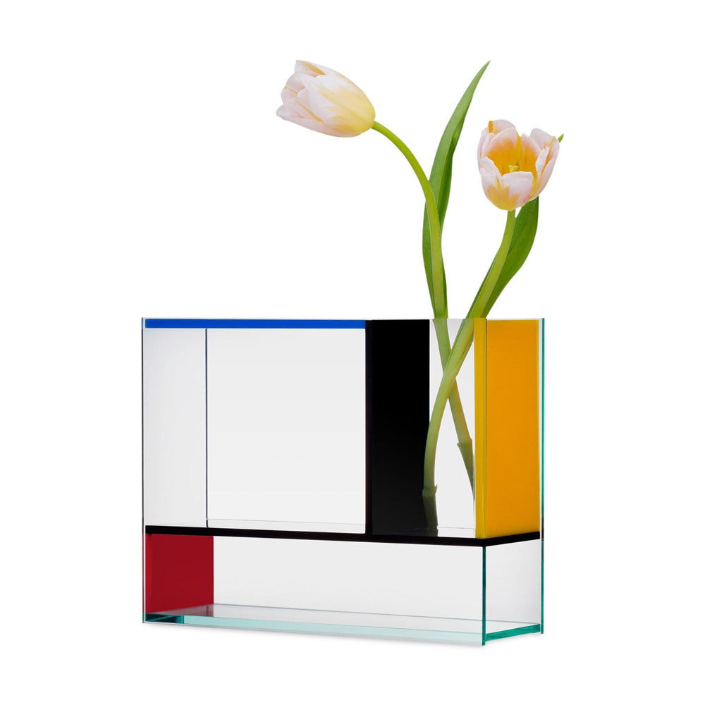 The Mondri Vase displayed horizontally with white flowers.