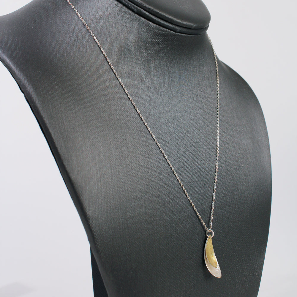 Side view necklace.