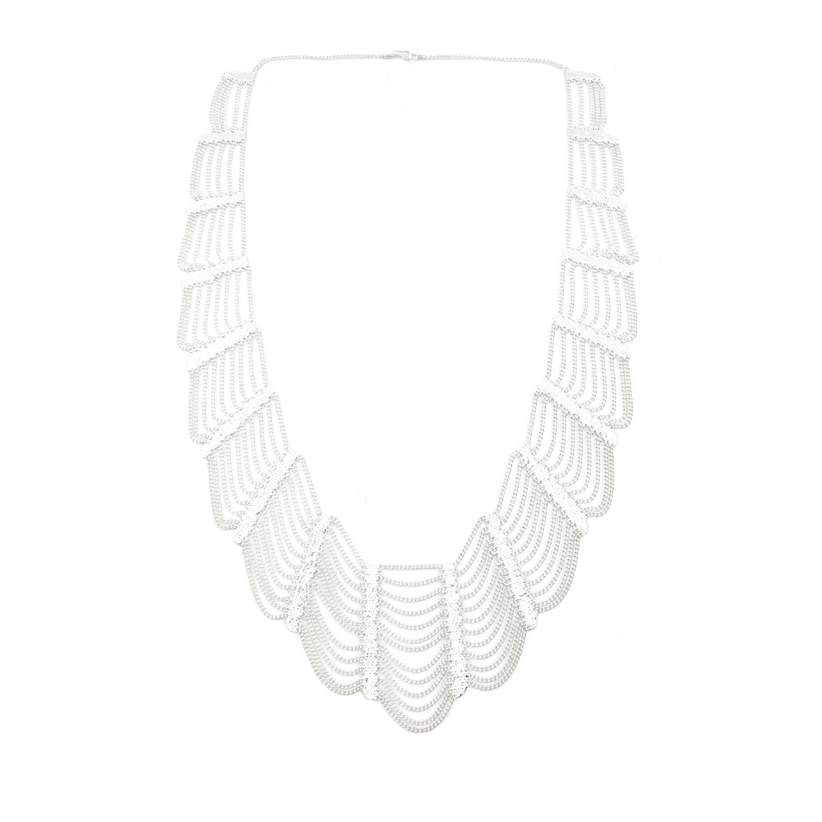 Silver layered necklace on a white background
