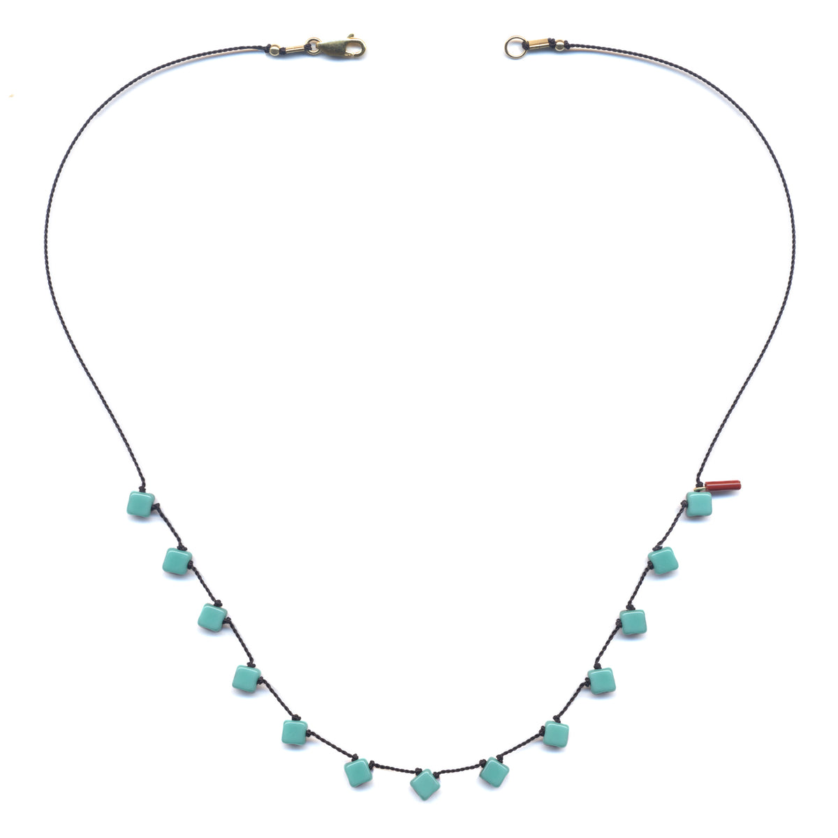 Necklace with turquoise beads on a white background