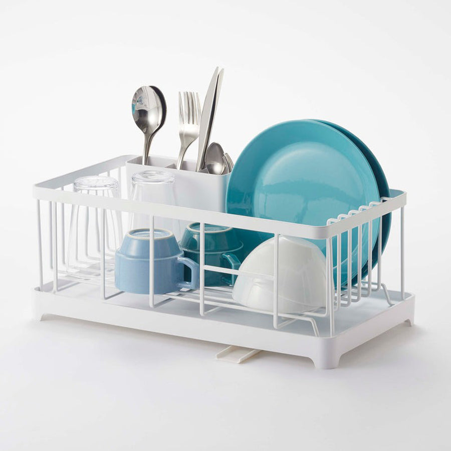 Dishes in dish rack.